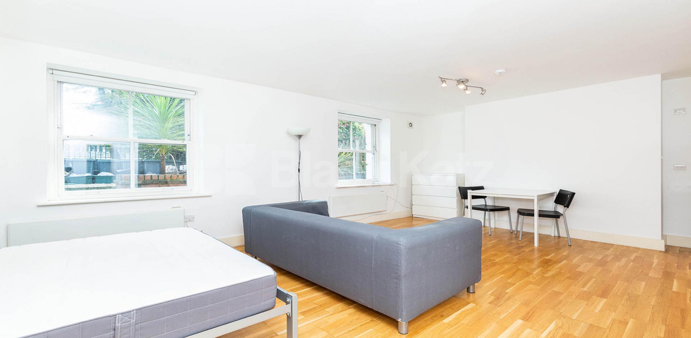 A fantastic spacious studio set within a gated double fronted house Camden Road , Camden Borders 